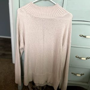 Mock neck/high neck stitch sweater with ribbing detail. Champagne color.